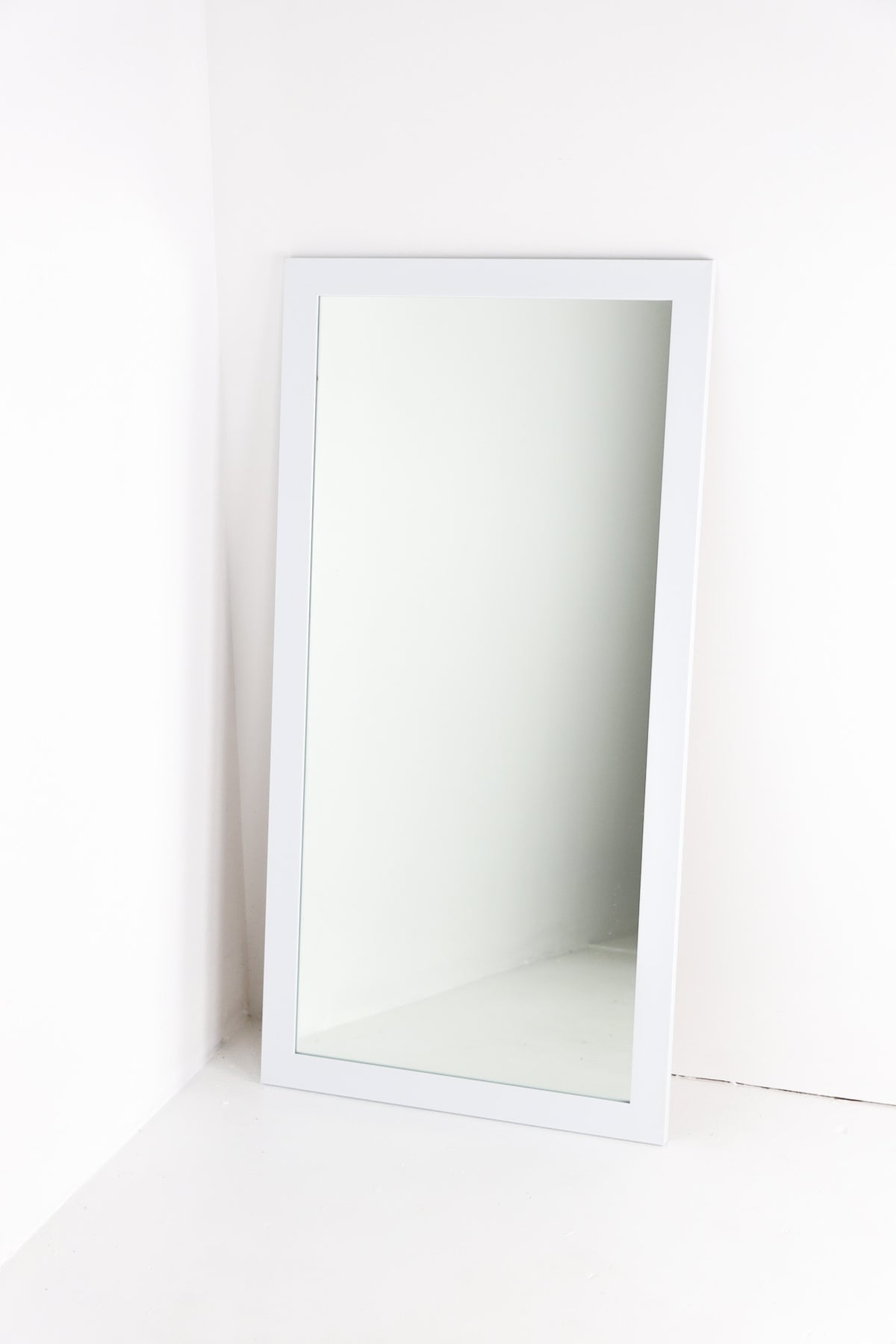 Mirror in white frame