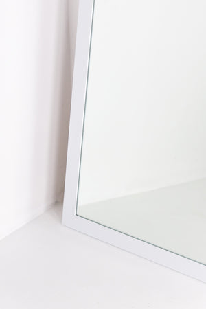 Mirror in white frame